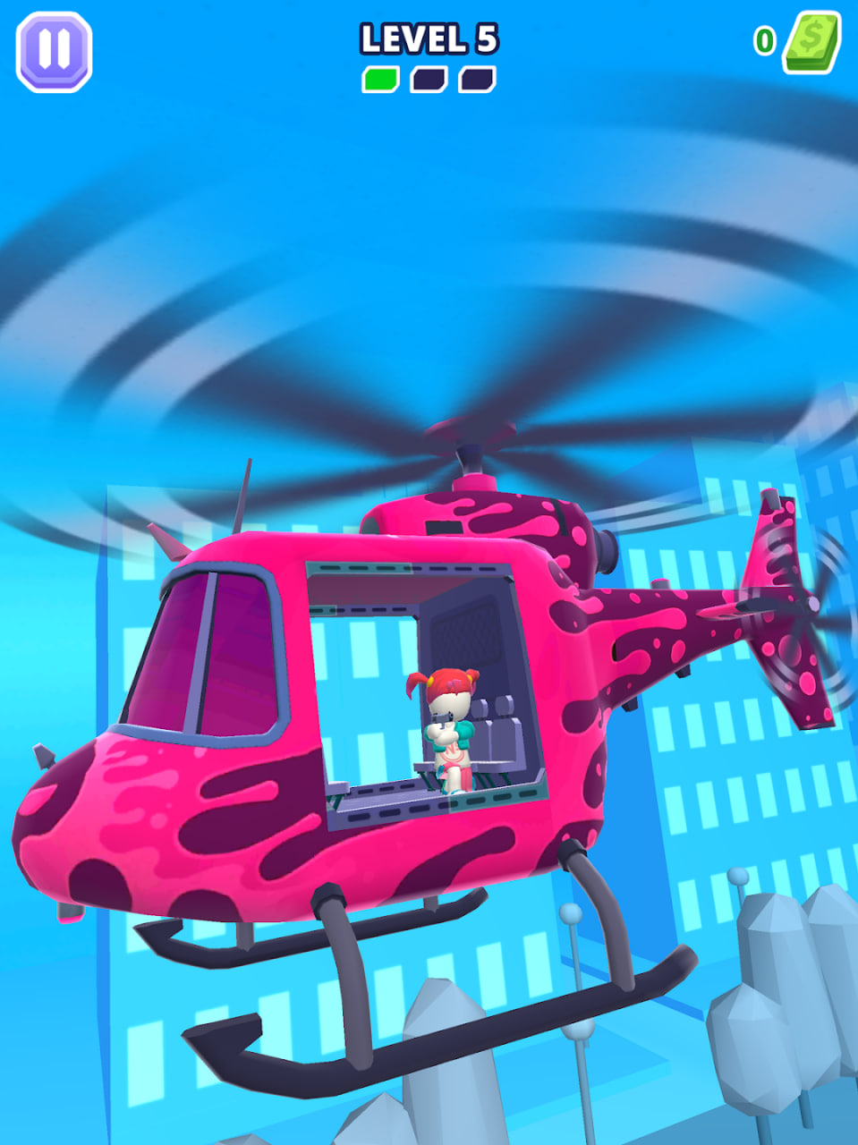 HellCopter poziom 5: różowy helikopter nad miastem